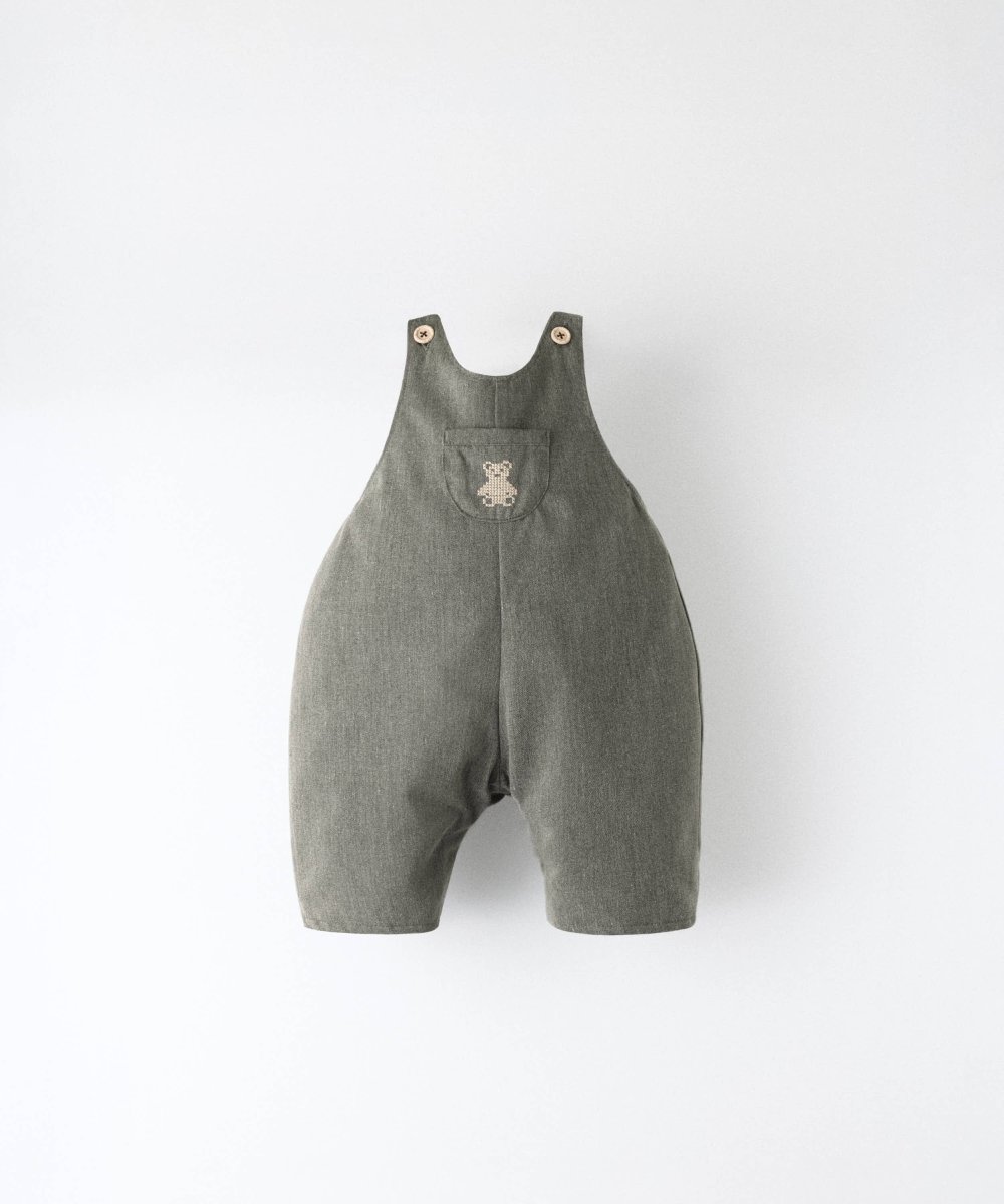 Peto de bebé Land Baby en kaki con osito bordado