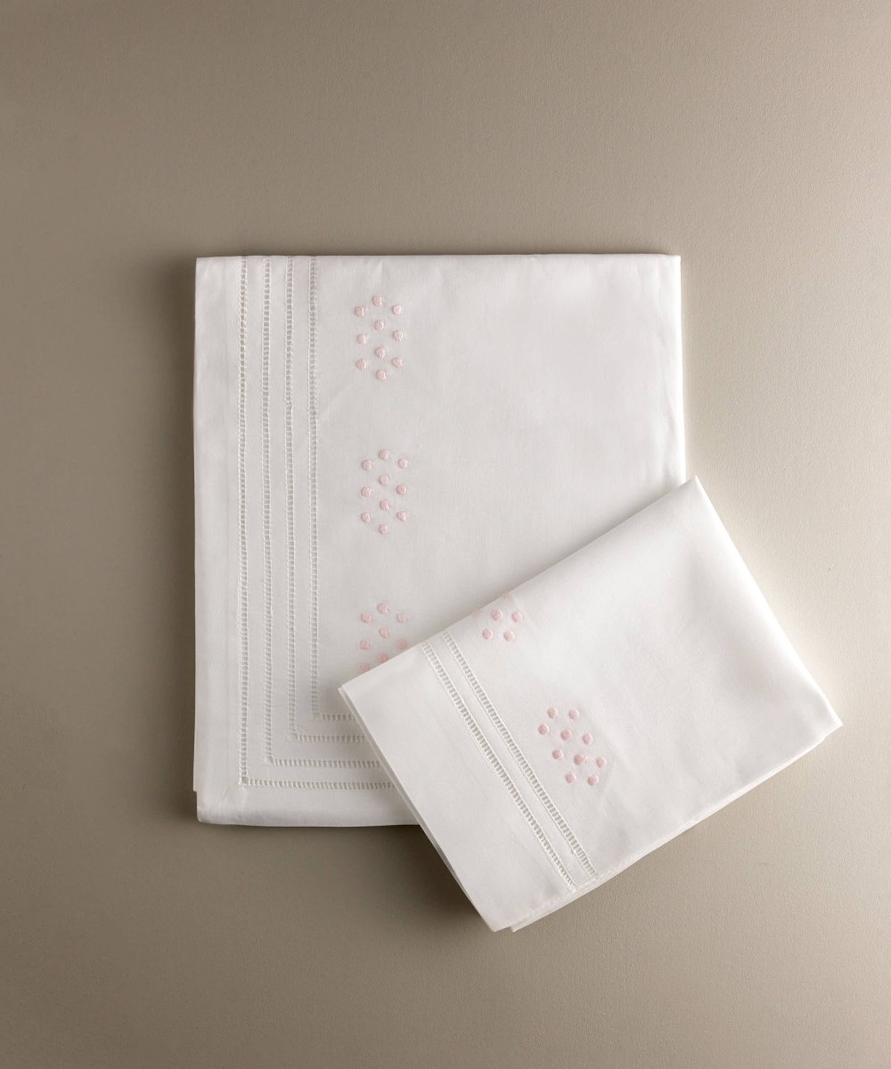 Juego de sábanas de cuna de algodón con bodoques bordados en rosa
